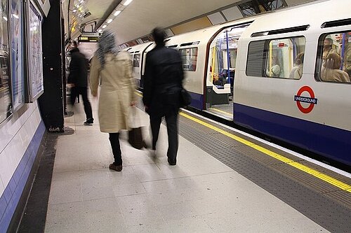 A London tube train at the platform.